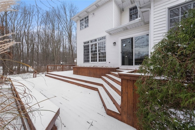 view of snow covered deck