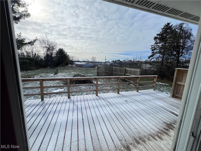 view of snow covered deck