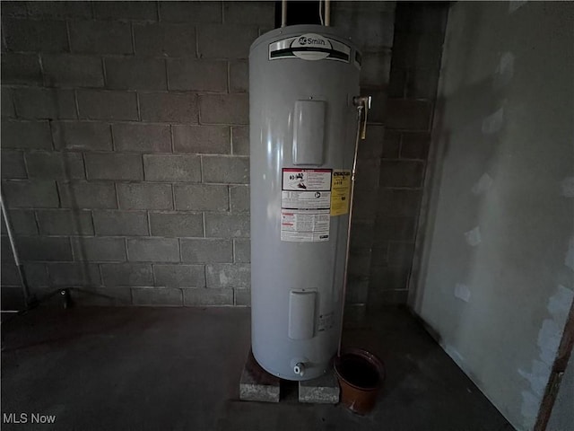 utility room with water heater