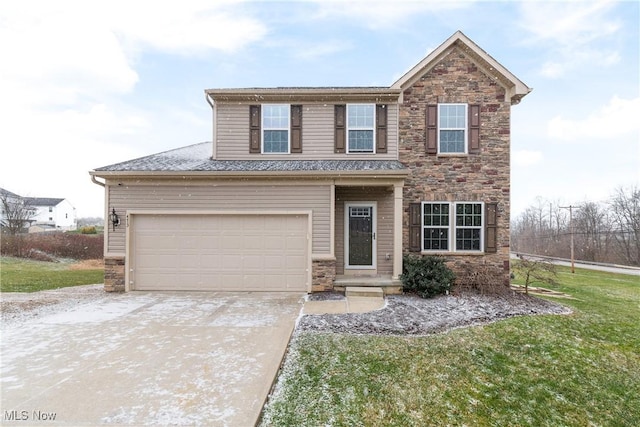 view of front facade featuring a front yard and a garage