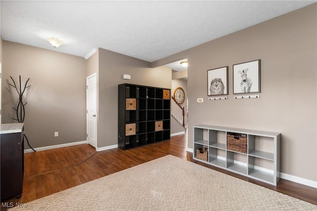 living area featuring dark hardwood / wood-style flooring