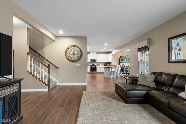 living room featuring dark hardwood / wood-style flooring