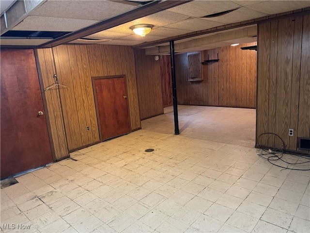 basement with wood walls