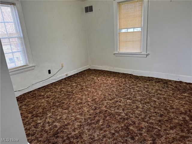 empty room featuring carpet