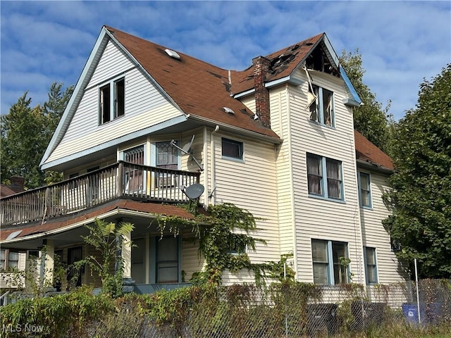 exterior space with a balcony