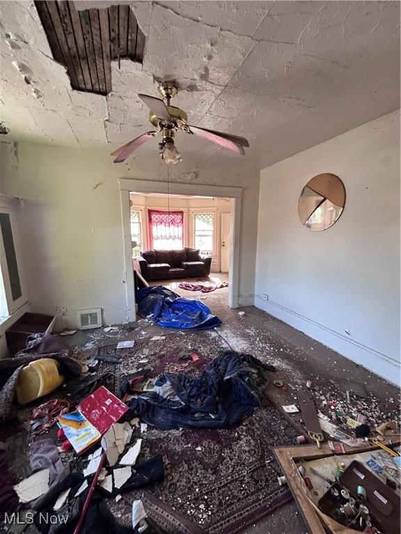 miscellaneous room featuring ceiling fan