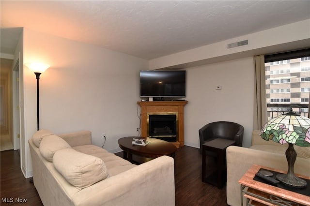 living room featuring dark hardwood / wood-style floors