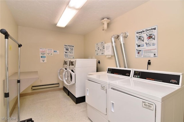 laundry area featuring independent washer and dryer and a textured ceiling