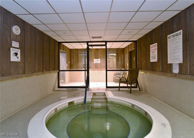 interior space featuring an indoor in ground hot tub