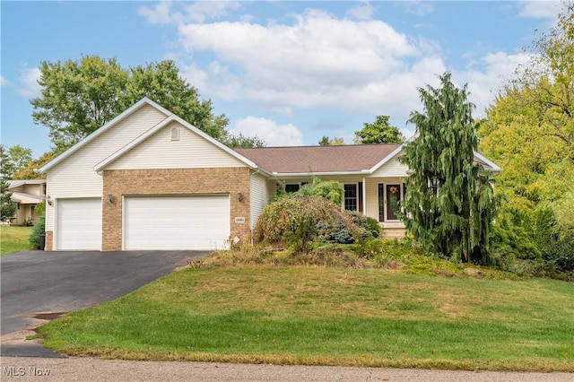 ranch-style house with a front lawn and a garage