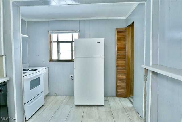 kitchen featuring ornamental molding, white appliances, and wooden walls