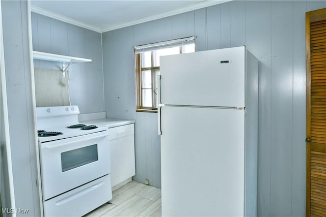 kitchen featuring white appliances, wooden walls, and crown molding