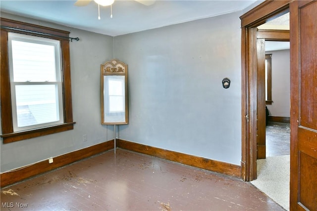 empty room featuring ceiling fan