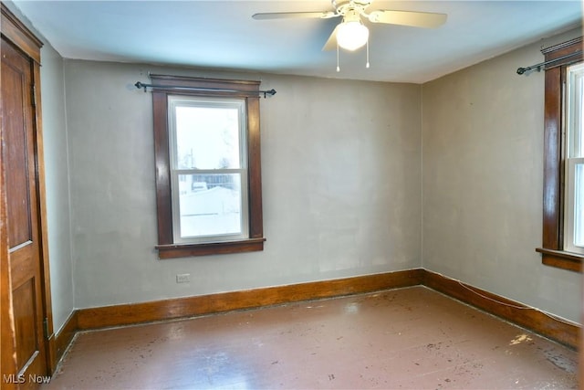 spare room with ceiling fan