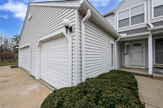 property entrance with a garage