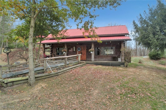 view of log cabin