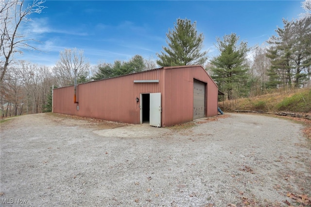 view of outdoor structure featuring a garage