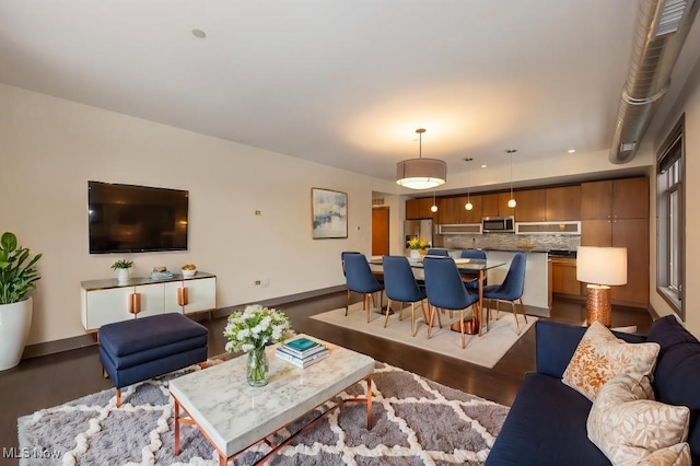 living room featuring dark hardwood / wood-style floors