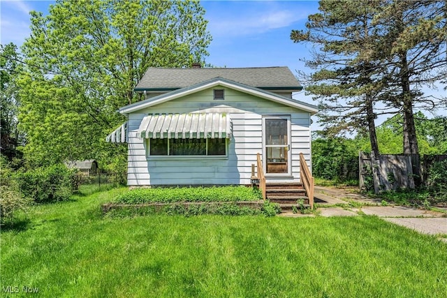 exterior space featuring a front yard