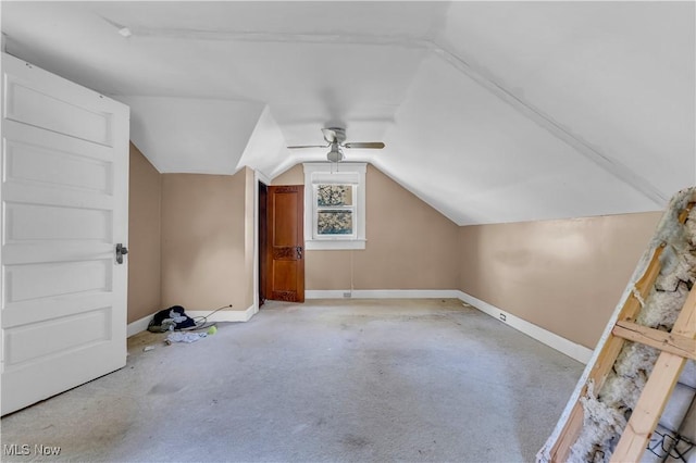 bonus room featuring ceiling fan, light carpet, and vaulted ceiling