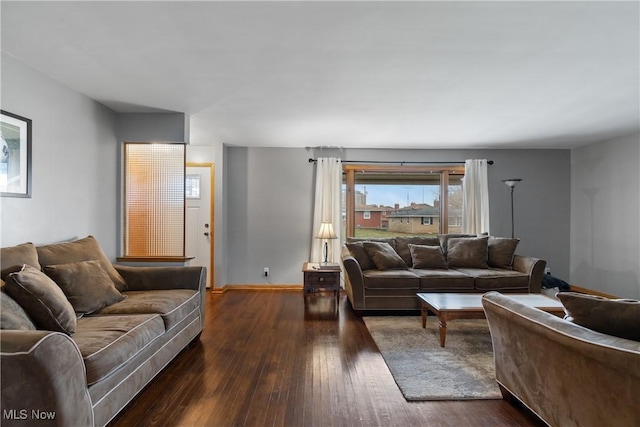 living room featuring dark hardwood / wood-style floors