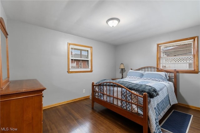 bedroom featuring dark hardwood / wood-style flooring