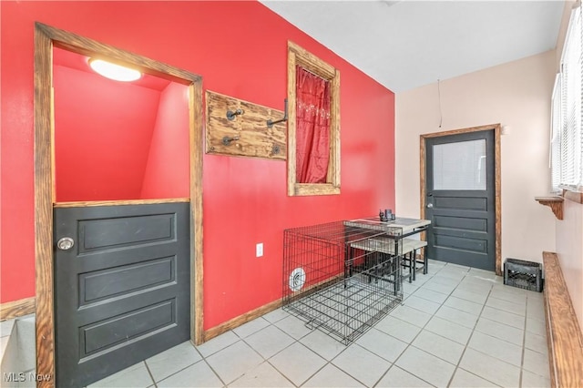 home office with light tile patterned floors