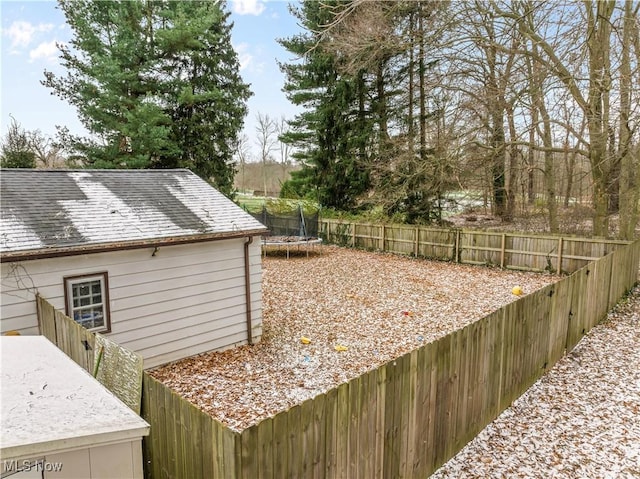 view of yard featuring a trampoline