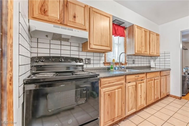 kitchen with backsplash, black range with electric stovetop, sink, and light tile patterned flooring