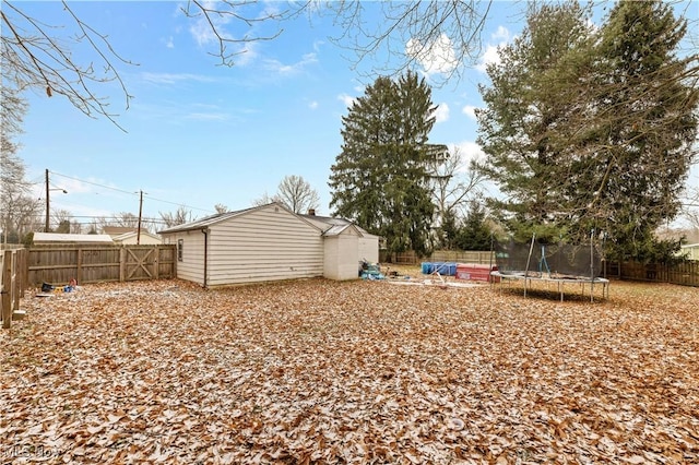 view of yard featuring a trampoline