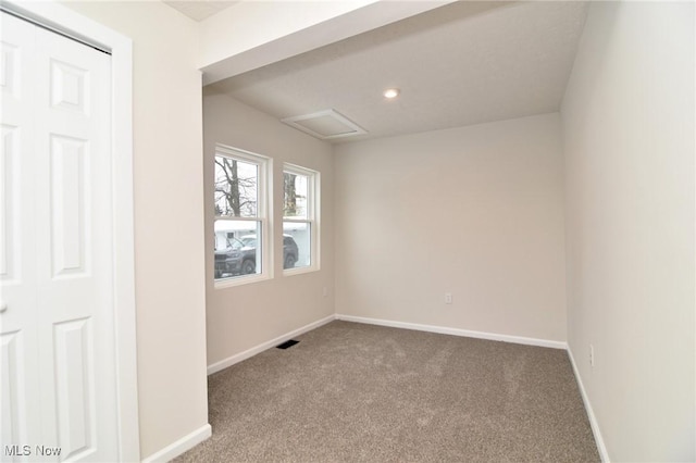 spare room with carpet floors