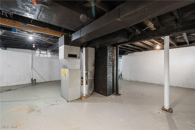 basement featuring heating unit