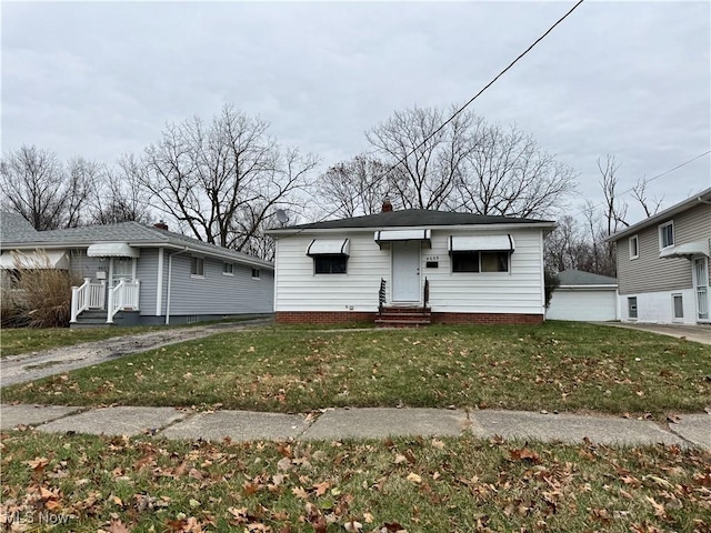 view of front of home with a front yard