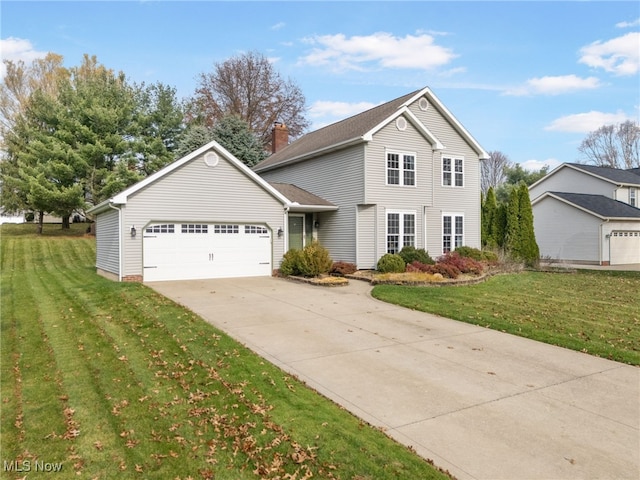 front of property with a front yard and a garage