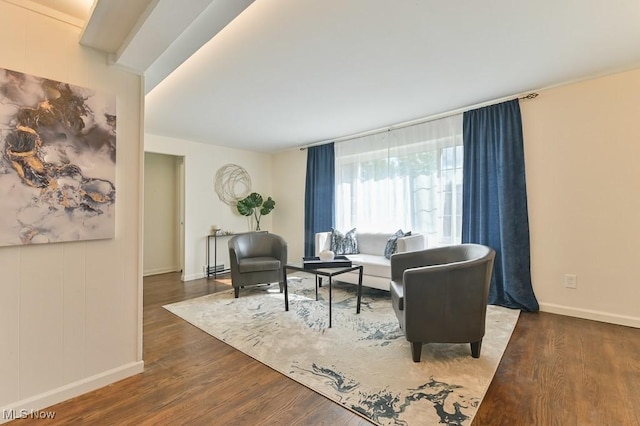 living room with dark hardwood / wood-style flooring