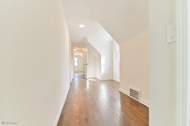 bonus room with wood-type flooring