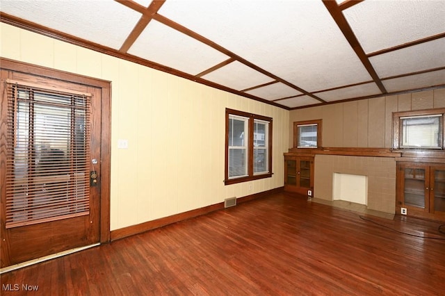 empty room with dark wood-type flooring