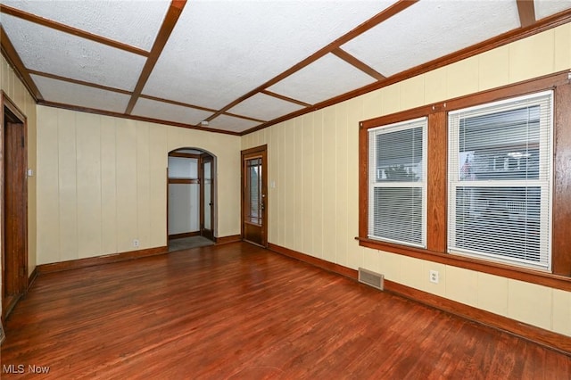 unfurnished room featuring dark wood-type flooring