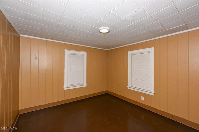 spare room with crown molding