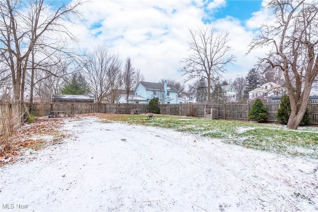 view of yard covered in snow