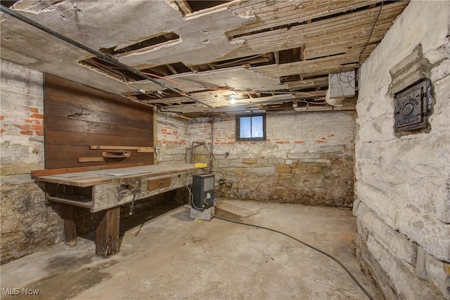 basement with a workshop area