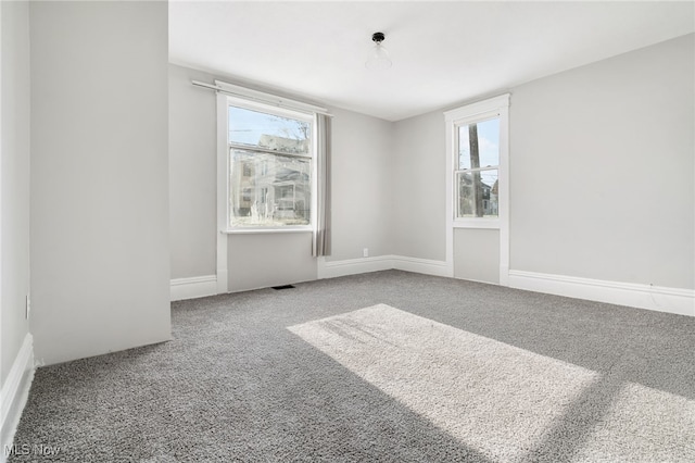 unfurnished room with carpet