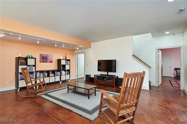 living room featuring track lighting