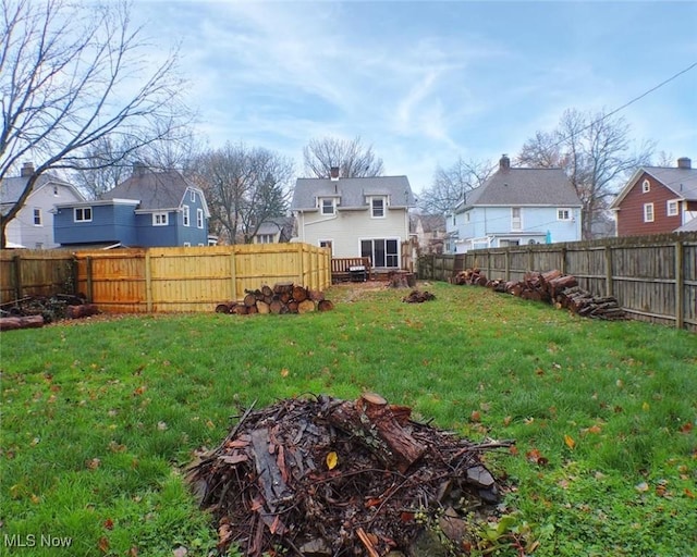 view of yard with an outdoor fire pit