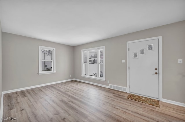 entryway with light wood-type flooring