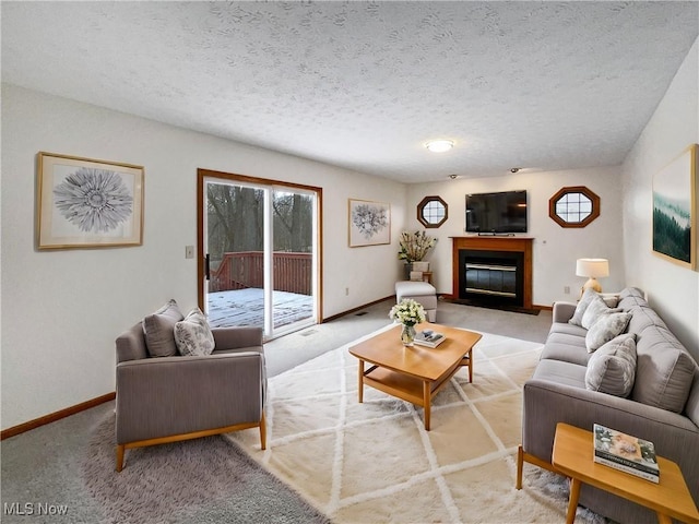 living room with a textured ceiling and light carpet