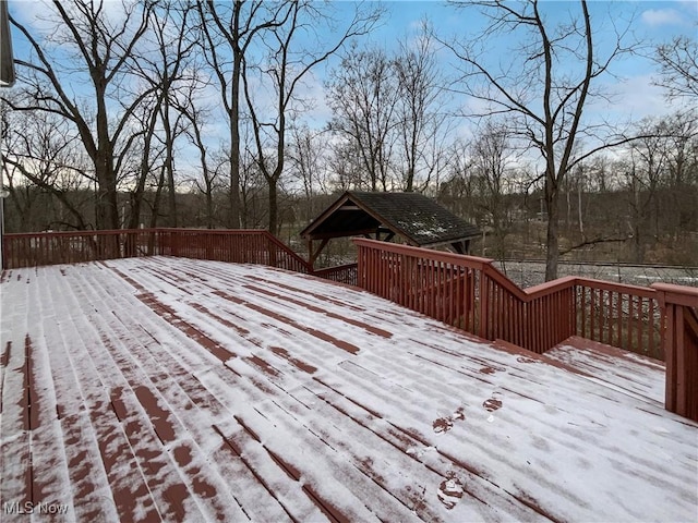 view of snow covered deck