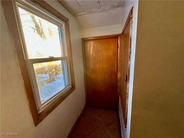 hall with dark parquet floors