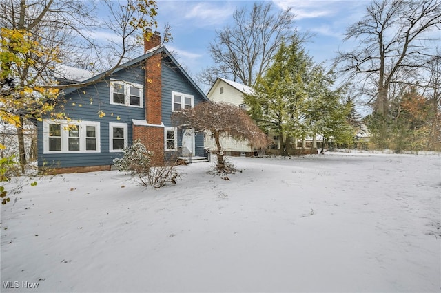 view of snow covered property