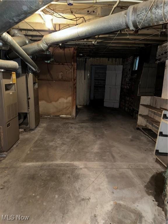 basement featuring heating unit